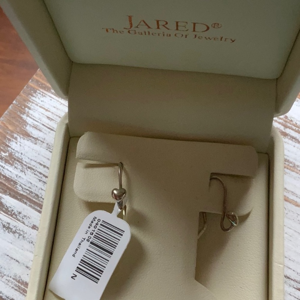 She went to Jared’s , sterling silver little heart earrings.
